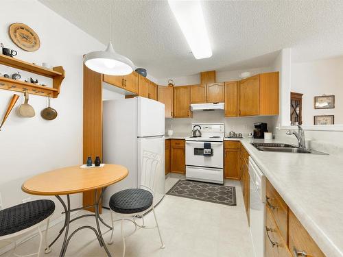 402 182 Haddow Close, Edmonton, AB - Indoor Photo Showing Kitchen With Double Sink