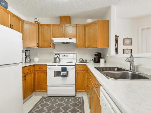 402 182 Haddow Close, Edmonton, AB - Indoor Photo Showing Kitchen With Double Sink