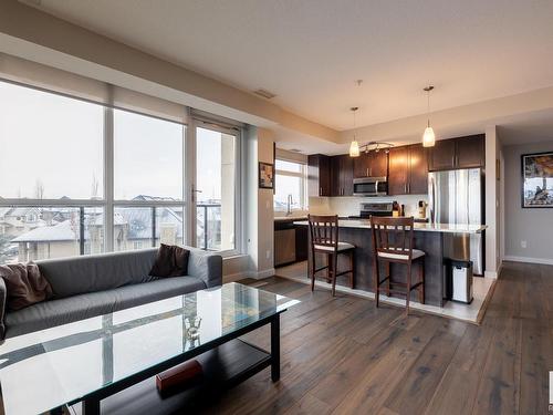 308 5151 Windermere Boulevard, Edmonton, AB - Indoor Photo Showing Living Room