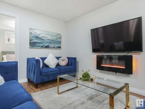 10543 128 Avenue, Edmonton, AB - Indoor Photo Showing Living Room With Fireplace