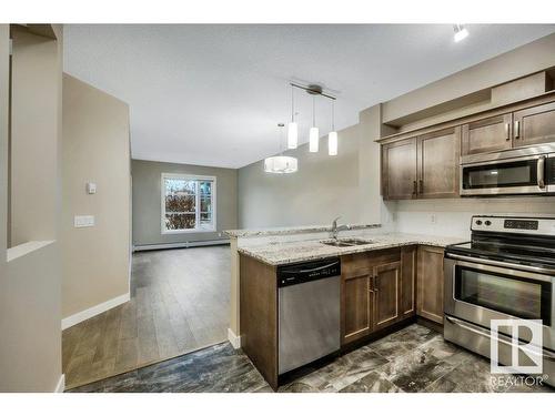 104 2584 Anderson Way, Edmonton, AB - Indoor Photo Showing Kitchen With Stainless Steel Kitchen With Double Sink