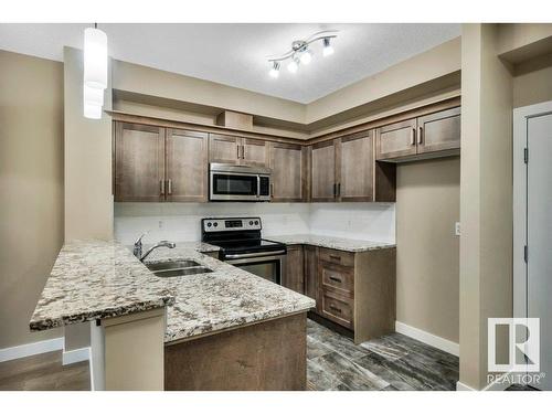 104 2584 Anderson Way, Edmonton, AB - Indoor Photo Showing Kitchen With Double Sink