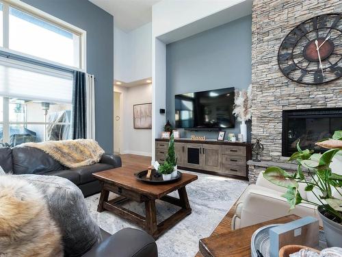 803 52328 Rge Road 233, Rural Strathcona County, AB - Indoor Photo Showing Living Room With Fireplace