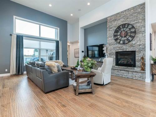 803 52328 Rge Road 233, Rural Strathcona County, AB - Indoor Photo Showing Living Room With Fireplace