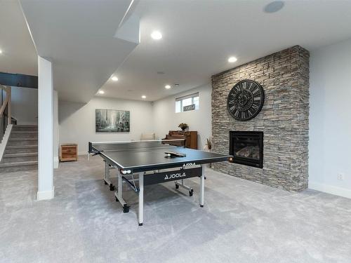 803 52328 Rge Road 233, Rural Strathcona County, AB - Indoor Photo Showing Other Room With Fireplace