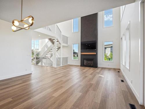 6 Coppice Hill Way, Ardrossan, AB - Indoor Photo Showing Living Room With Fireplace