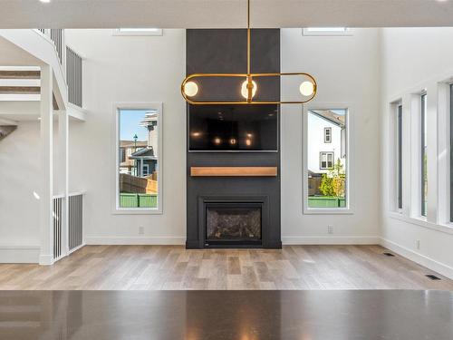 6 Coppice Hill Way, Ardrossan, AB - Indoor Photo Showing Living Room With Fireplace