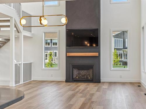 6 Coppice Hill Way, Ardrossan, AB - Indoor Photo Showing Living Room With Fireplace