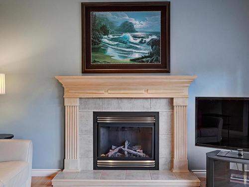 211 Darlington Crescent, Edmonton, AB - Indoor Photo Showing Living Room With Fireplace