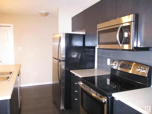 401 508 Albany Way Nw, Edmonton, AB - Indoor Photo Showing Kitchen With Stainless Steel Kitchen