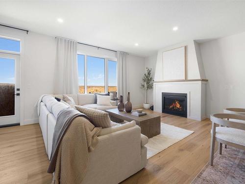 41 Darby Crescent, Spruce Grove, AB - Indoor Photo Showing Living Room With Fireplace