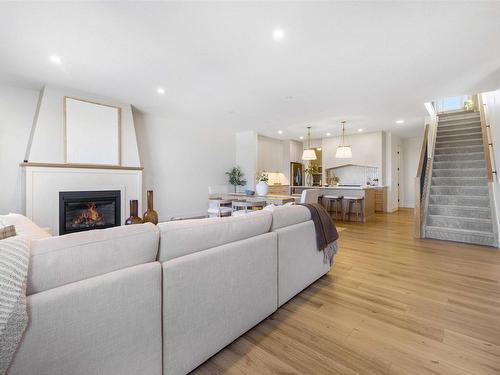 41 Darby Crescent, Spruce Grove, AB - Indoor Photo Showing Living Room With Fireplace