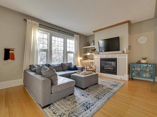 10526 127 Street, Edmonton, AB - Indoor Photo Showing Living Room With Fireplace