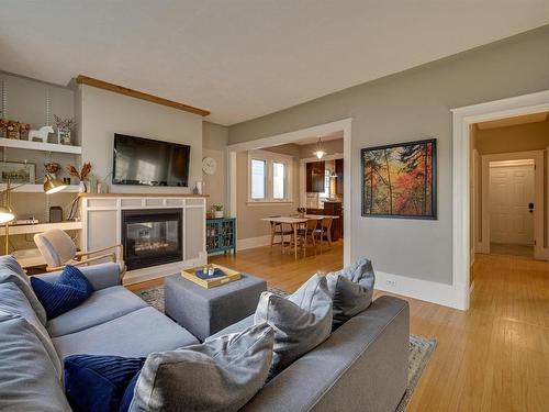 10526 127 Street, Edmonton, AB - Indoor Photo Showing Living Room With Fireplace