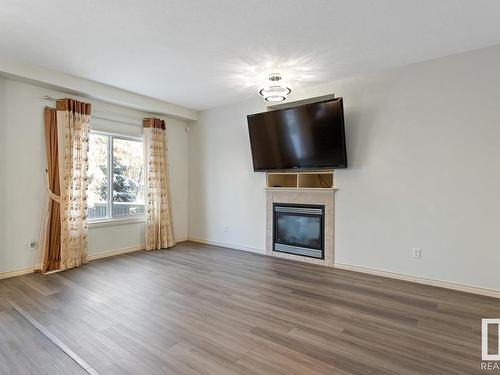 21152 46 Avenue, Edmonton, AB - Indoor Photo Showing Living Room With Fireplace