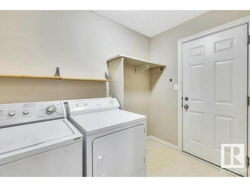 103 Rue Masson, Beaumont, AB - Indoor Photo Showing Laundry Room