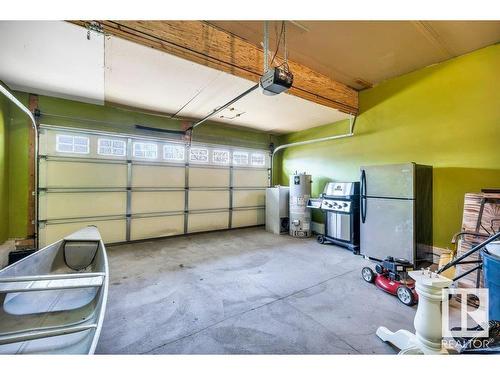 103 Rue Masson, Beaumont, AB - Indoor Photo Showing Garage