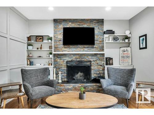 16 Westridge Crescent, Edmonton, AB - Indoor Photo Showing Living Room With Fireplace