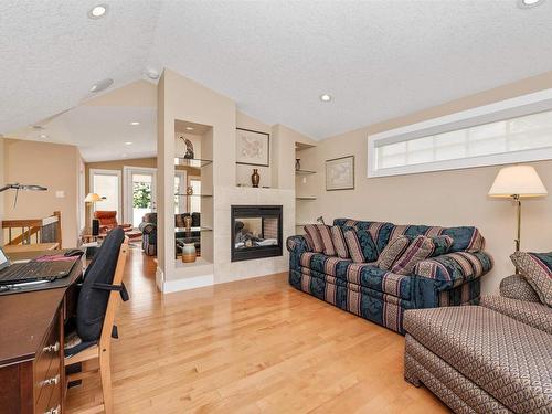 8728 101 Avenue, Edmonton, AB - Indoor Photo Showing Living Room With Fireplace