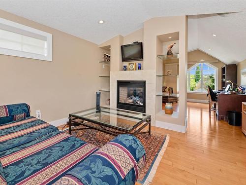 8728 101 Avenue, Edmonton, AB - Indoor Photo Showing Living Room With Fireplace