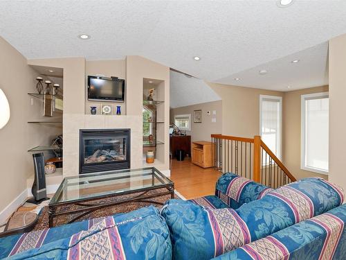 8728 101 Avenue, Edmonton, AB - Indoor Photo Showing Living Room With Fireplace