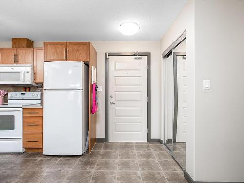 216 11615 Ellerslie Road, Edmonton, AB - Indoor Photo Showing Kitchen