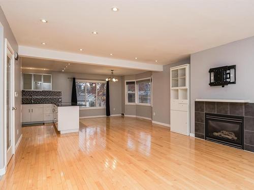 11231 75 Avenue, Edmonton, AB - Indoor Photo Showing Living Room With Fireplace