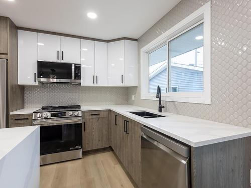 15239 83 Avenue, Edmonton, AB - Indoor Photo Showing Kitchen With Double Sink With Upgraded Kitchen