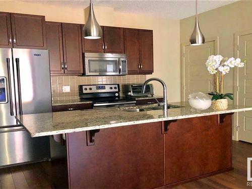 108 504 Griesbach Parade, Edmonton, AB - Indoor Photo Showing Kitchen With Double Sink With Upgraded Kitchen