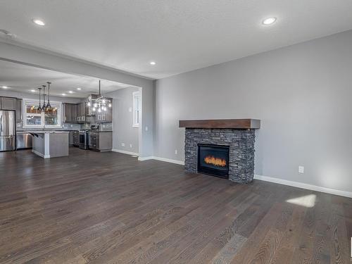 5108 Corvette Street, Edmonton, AB - Indoor Photo Showing Living Room With Fireplace