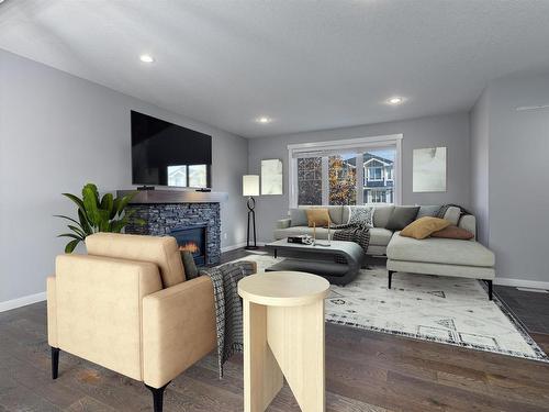 5108 Corvette Street, Edmonton, AB - Indoor Photo Showing Living Room With Fireplace