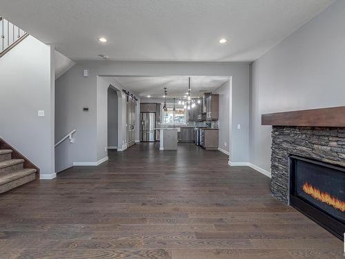 5108 Corvette Street, Edmonton, AB - Indoor Photo Showing Living Room With Fireplace