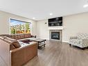 720 40 Avenue, Edmonton, AB  - Indoor Photo Showing Living Room With Fireplace 