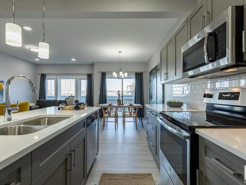 8632 97 Avenue, Morinville, AB - Indoor Photo Showing Kitchen With Double Sink With Upgraded Kitchen