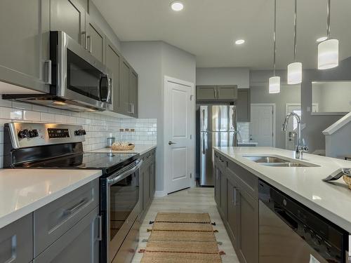 8632 97 Avenue, Morinville, AB - Indoor Photo Showing Kitchen With Double Sink With Upgraded Kitchen