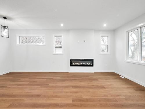 11932 64 Street Nw, Edmonton, AB - Indoor Photo Showing Other Room With Fireplace