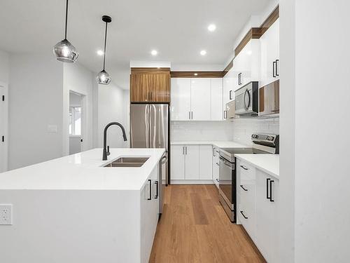 11932 64 Street Nw, Edmonton, AB - Indoor Photo Showing Kitchen With Double Sink With Upgraded Kitchen