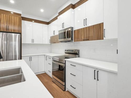 11932 64 Street Nw, Edmonton, AB - Indoor Photo Showing Kitchen With Double Sink With Upgraded Kitchen