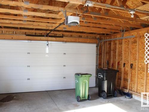 1672 Tompkins Place Nw, Edmonton, AB - Indoor Photo Showing Garage