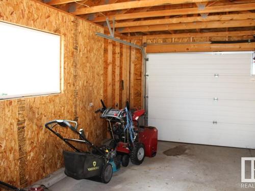 1672 Tompkins Place Nw, Edmonton, AB - Indoor Photo Showing Garage