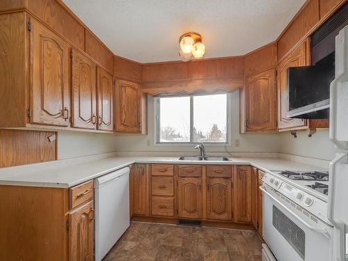 5105 57 Avenue, Leduc, AB - Indoor Photo Showing Kitchen With Double Sink