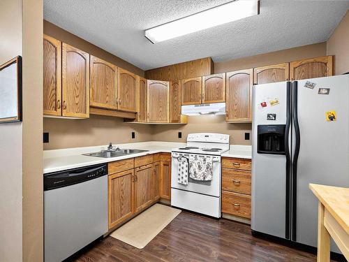 402 15503 106 Street, Edmonton, AB - Indoor Photo Showing Kitchen With Double Sink