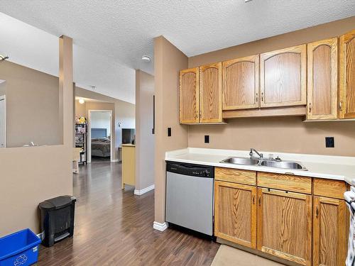 402 15503 106 Street, Edmonton, AB - Indoor Photo Showing Kitchen With Double Sink