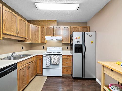 402 15503 106 Street, Edmonton, AB - Indoor Photo Showing Kitchen With Double Sink