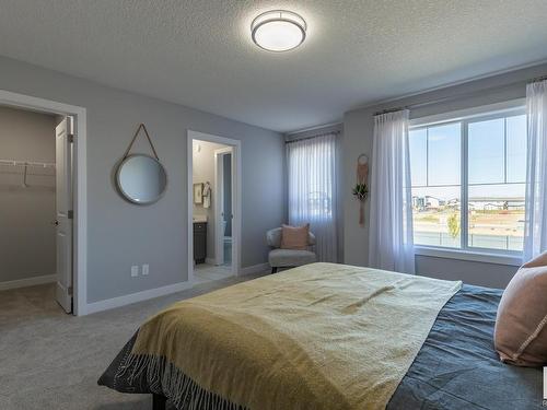 65 Hilton Cove, Spruce Grove, AB - Indoor Photo Showing Bedroom