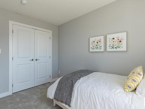 65 Hilton Cove, Spruce Grove, AB - Indoor Photo Showing Bedroom