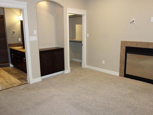 5102 53A Avenue, Legal, AB - Indoor Photo Showing Other Room With Fireplace