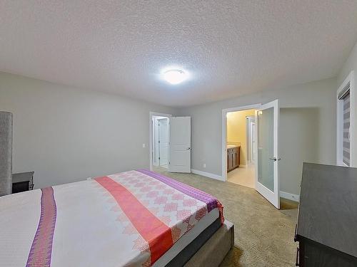 3938 Cherry Cove Sw, Edmonton, AB - Indoor Photo Showing Bedroom