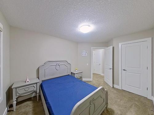 3938 Cherry Cove Sw, Edmonton, AB - Indoor Photo Showing Bedroom