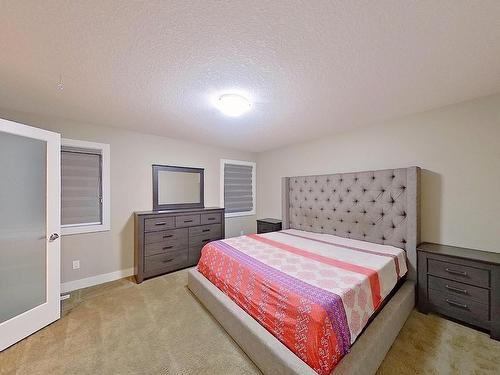 3938 Cherry Cove Sw, Edmonton, AB - Indoor Photo Showing Bedroom